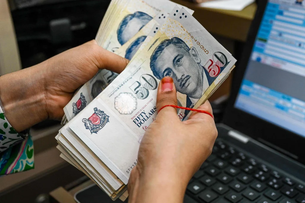Singapore’s snowballing cash levels are boosting local bonds