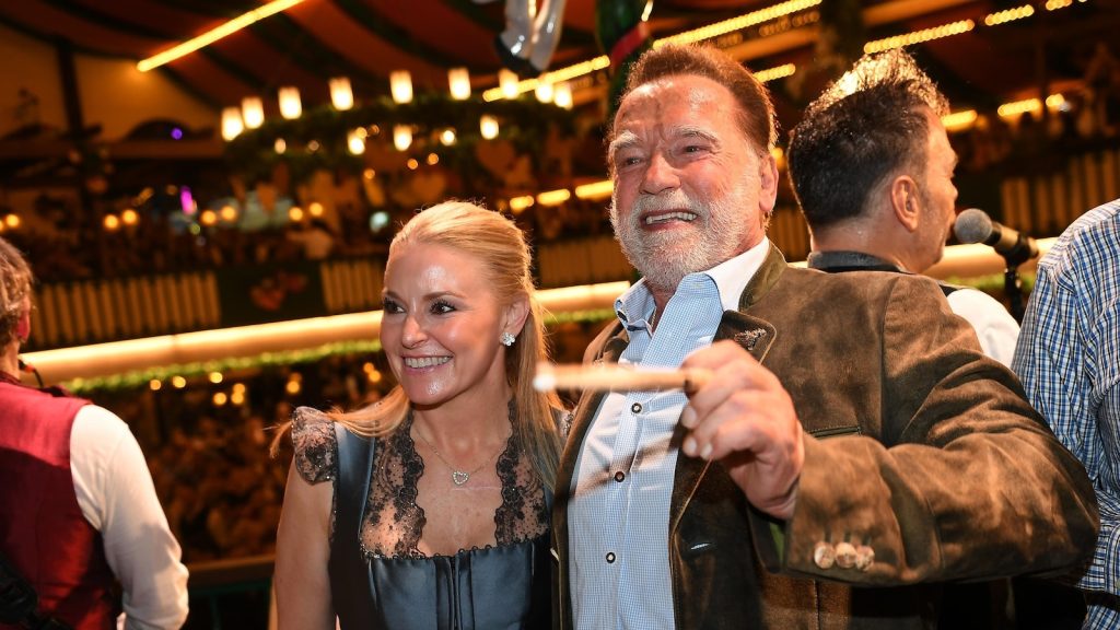 Schwarzenegger directs a band in a beer tent at Munich’s Oktoberfest