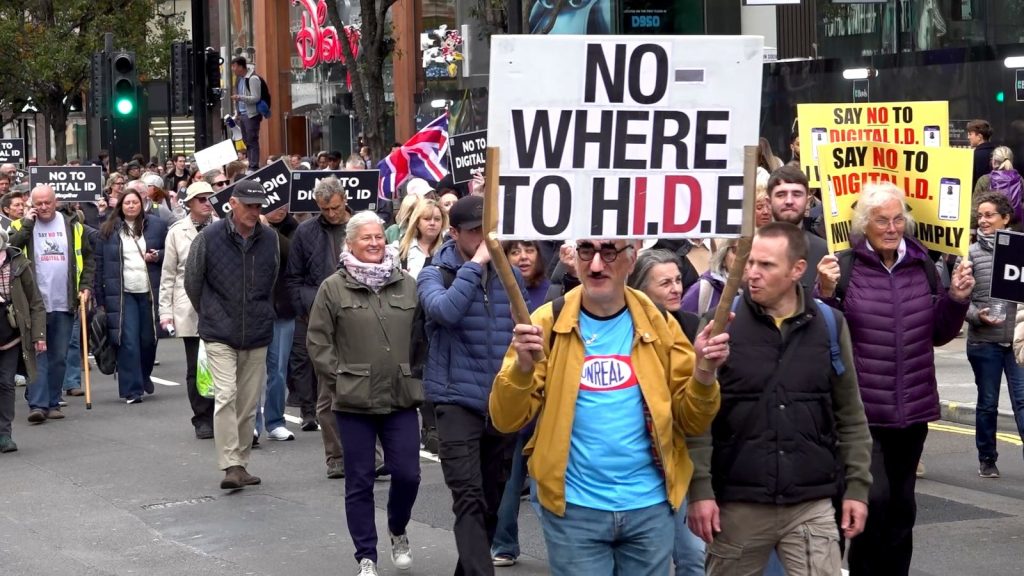 Thousands of protesters march through London streets against digital ID plans | UK News
