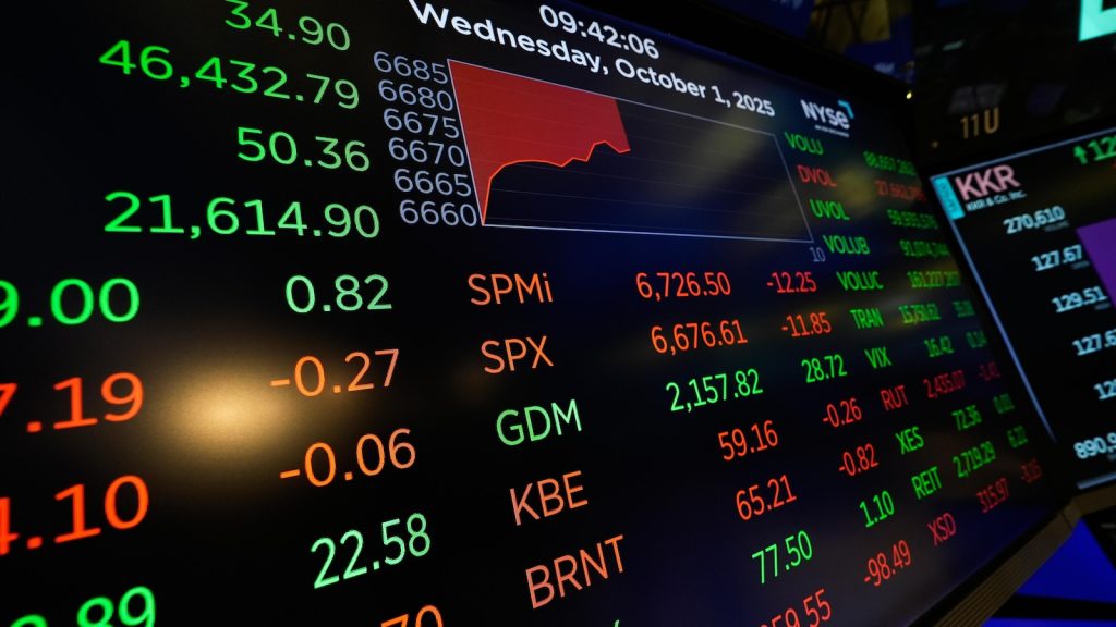 Asian shares are mixed as tech shares lead Wall Street ticks to more records