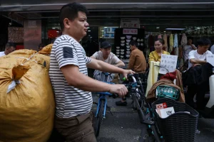 China to expand public service access for migrant workers