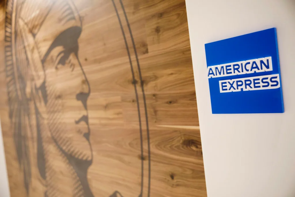 AmEx lifts revenue forecast, unchanged profit outlook weighs on shares