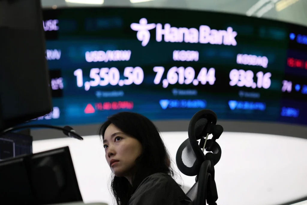 Asian shares rise as AI spending hopes lift regional chipmakers