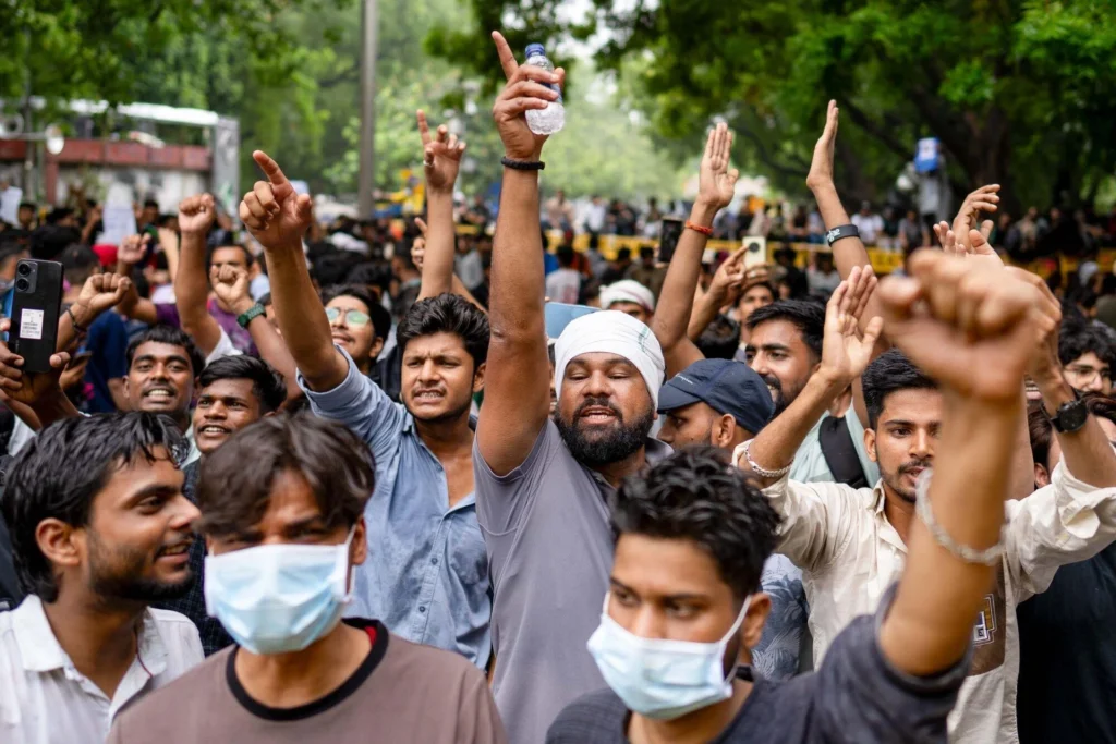 Modi seeks to calm anger in rare video as India protests widen over exam paper leak