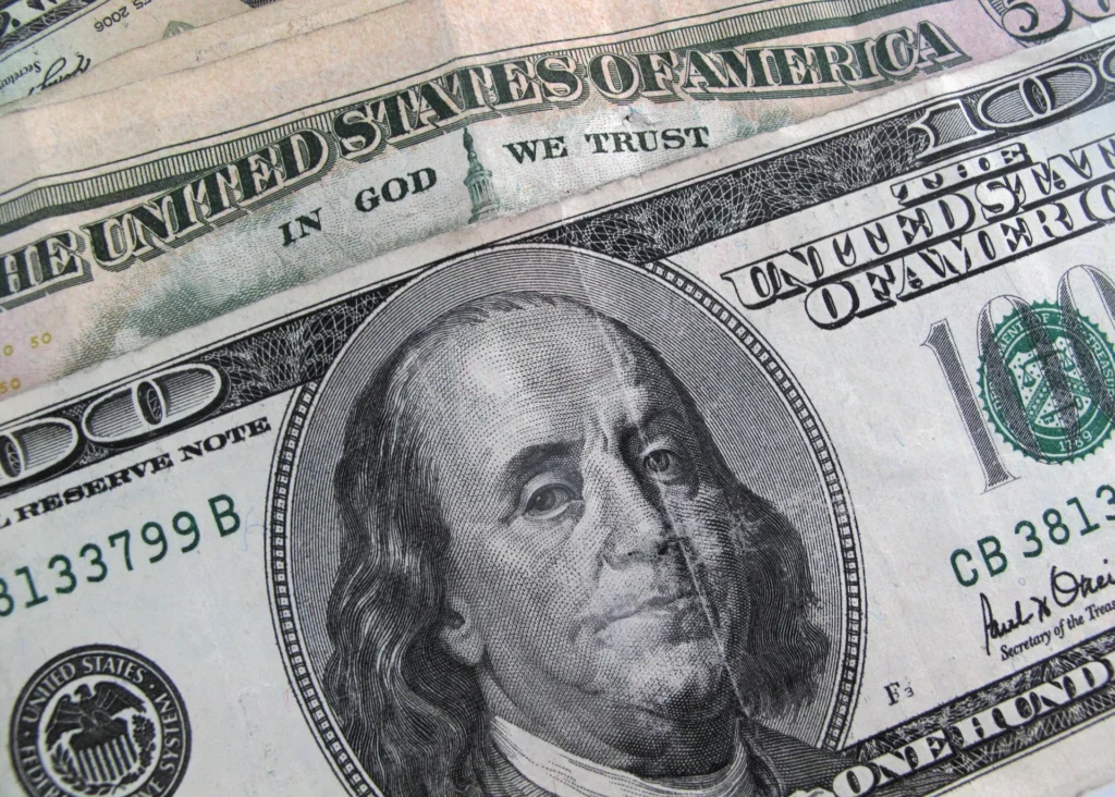 US dollar steady as investors weigh Middle East jitters against softer inflation data