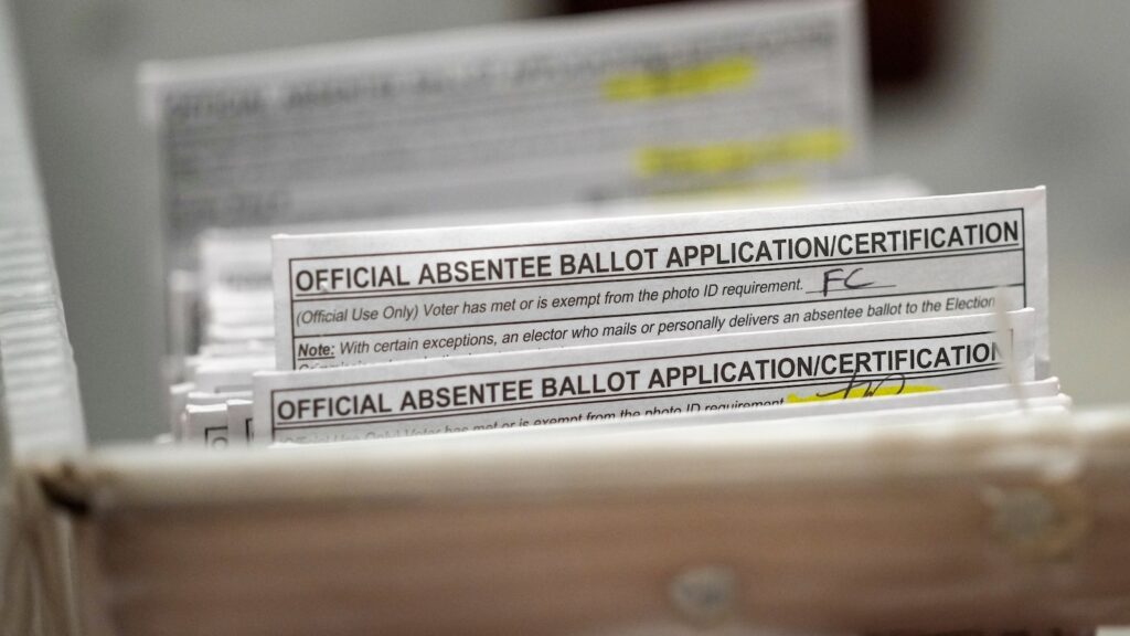 Wisconsin absentee voters seek court ruling allowing them to cast new ballots