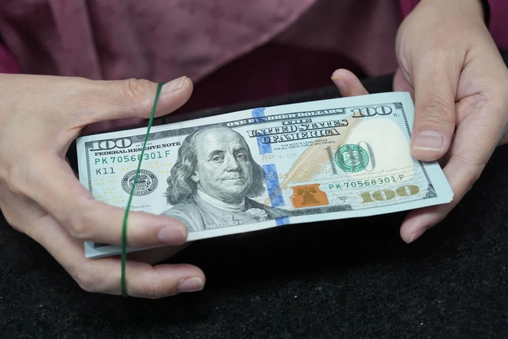 Greenback steadies after benign US inflation curbs Fed rate hike bets