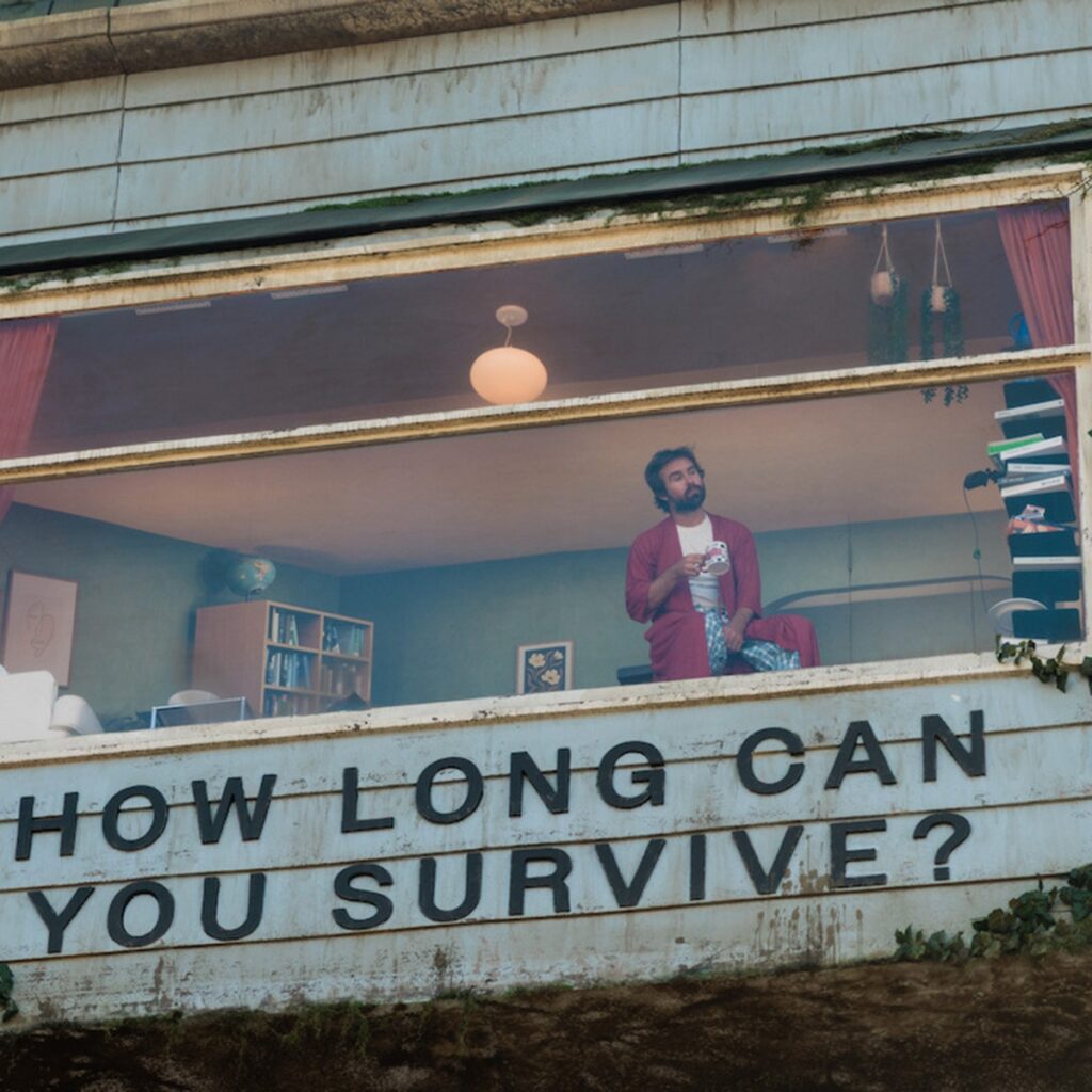 Netflix’s The Last House Billboard on Sunset Blvd Has Man Living Inside
