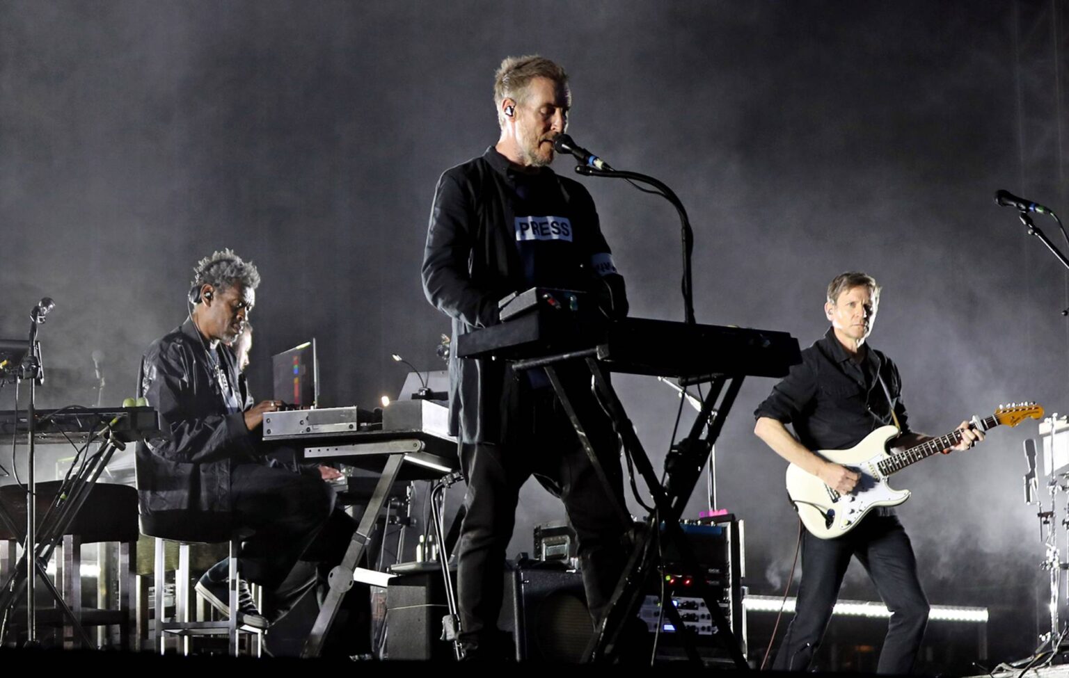 Massive Attack say entire band were detained and some had passports confiscated in Singapore after Palestine flag display